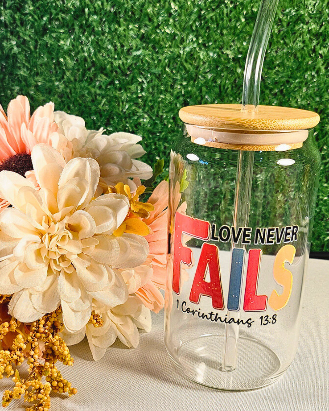 Love Never Fails Glass Tumbler